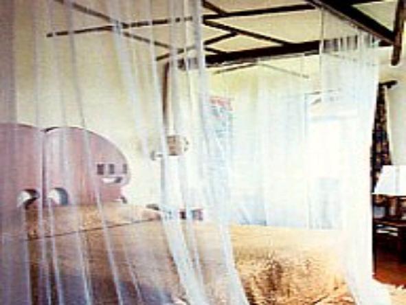 Serengeti Serena Safari Lodge - Bedroom 